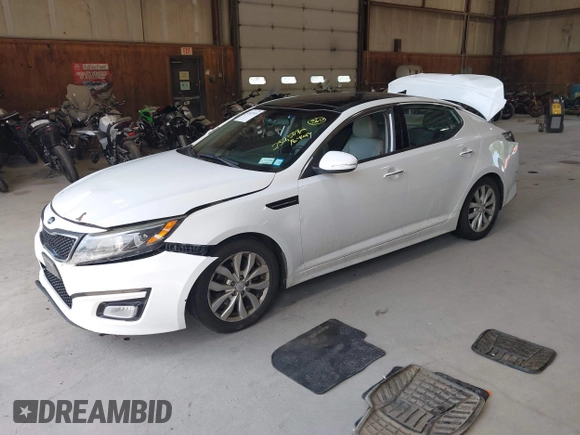 2015 Kia Optima EX z VIN 5XXGN4A7XFG415028, wystawiony jako IAAI lot #42635519 z przebiegiem 232 507 mil mil oraz . Historia ofert i sprzedaży dostępna na DreamBid. Obrazek 16.