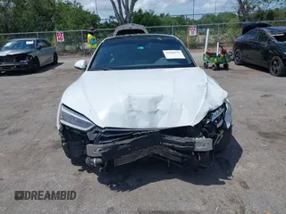 2019 Audi A5 Sportback Premium z VIN WAUANCF56KA080411, wystawiony jako IAAI lot #42208539 z przebiegiem 131 690 mil mil oraz . Historia ofert i sprzedaży dostępna na DreamBid. Obrazek 13.