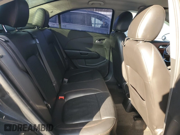 2015 Chevrolet Sonic LTZ z VIN 1G1JE5SB5F4106391, wystawiony jako Copart lot #41699175 z przebiegiem 113 683 mil mil oraz Szkoda całkowita • Salvage title. Historia ofert i sprzedaży dostępna na DreamBid. Obrazek 10.