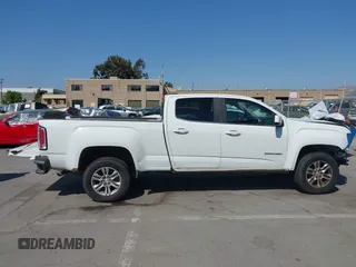 2019 GMC Canyon 2WD SLE z VIN 1GTG5CEN1K1210562, wystawiony jako IAAI lot #42419697 z przebiegiem 115 702 mil mil oraz . Historia ofert i sprzedaży dostępna na DreamBid. Obrazek 14.