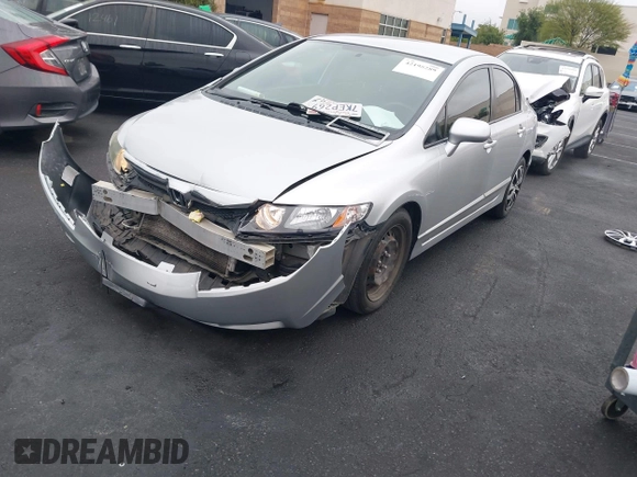 2011 Honda Civic LX with VIN 2HGFA1F54BH303802, listed as a IAAI auction lot 42195289 with 101,882 mi miles and . Bid and sale history available at DreamBid. Image 2.