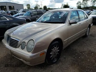 2002 Mercedes-Benz E-Class with VIN WDBJF82JX2X070380, listed as a Copart auction lot 68675974 with 88,274 mi miles and Salvage Title. Bid and sale history available at carsss.com. Image 1.