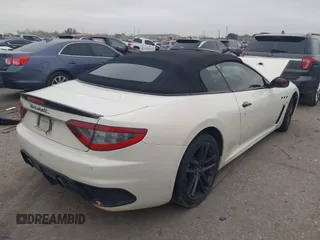 2013 Maserati GranTurismo Convertible Sport with VIN ZAM45VMA9D0070293, listed as a IAAI auction lot 41241020 with 69,156 mi miles. Bid and sale history available at carsss.com. Image 4.