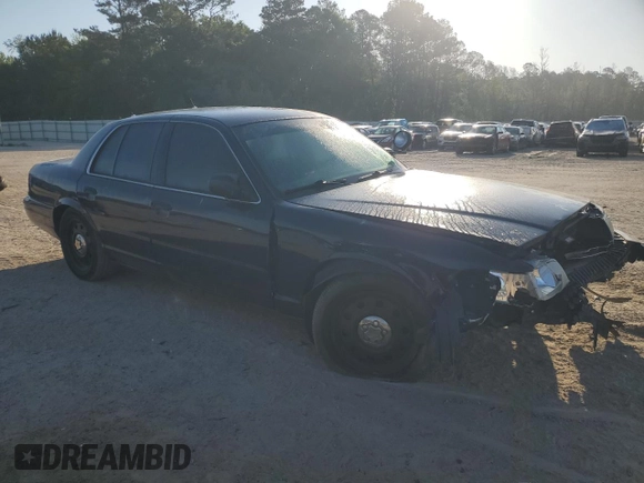 2004 Ford Police Interceptor Base w/3.27 Axle with VIN 2FAFP71W24X124818, listed as a Copart auction lot 53459295 with 153,125 mi miles and Salvage title. Bid and sale history available at DreamBid. Image 4.