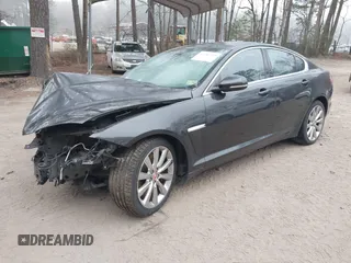 2014 Jaguar XF V6 SC with VIN SAJWJ0EF9E8U12853, listed as a IAAI auction lot 41780409 with 138,329 mi miles. Bid and sale history available at carsss.com. Image 18.