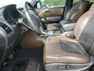2018 Nissan Armada Platinum z VIN JN8AY2NF5J9332894, wystawiony jako Copart lot #52749905 z przebiegiem 128 352 mil mil oraz Szkody całkowita. Historia ofert i sprzedaży dostępna na DreamBid. Obrazek 7.