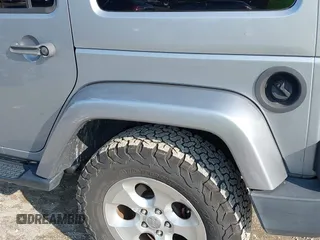 2015 Jeep Wrangler Unlimited Sahara with VIN 1C4BJWEG9FL570780, listed as a IAAI auction lot 42474940 with 116,226 mi miles and . Bid and sale history available at DreamBid. Image 12.