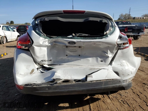 2017 Ford Focus SE with VIN 1FADP3K24HL247048, listed as a Copart auction lot 52564945 with 128,762 mi miles and Salvage Title. Bid and sale history available at carsss.com. Image 6.