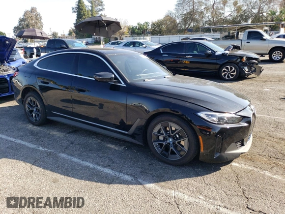 2023 BMW i4 eDrive35 with VIN WBY43AW08PFR28814, listed as a Copart auction lot 42641234 with 13,818 mi miles. Bid and sale history available at carsss.com. Image 4.