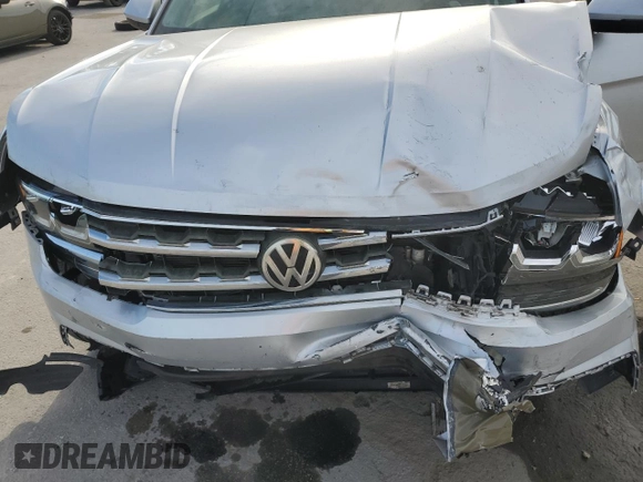 2018 Volkswagen Atlas SE с VIN 1V2DR2CA8JC579860, выставлен на аукционе Copart как лот 48122545 с пробегом 123 298 миль миль и Списание • Salvage title. История ставок и продаж доступна на DreamBid. Изображение 13.