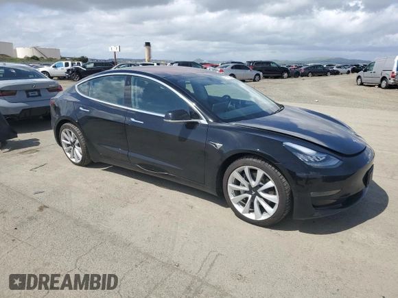 2018 Tesla Model 3 Long Range Battery with VIN 5YJ3E1EB1JF186827, listed as a Copart auction lot 51179535 with 53,649 mi miles and Salvage Title. Bid and sale history available at DreamBid. Image 4.