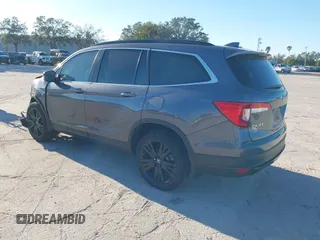 2022 Honda Pilot Special Edition with VIN 5FNYF5H25NB035016, listed as a IAAI auction lot 41248194 with 30,039 mi miles and . Bid and sale history available at DreamBid. Image 3.