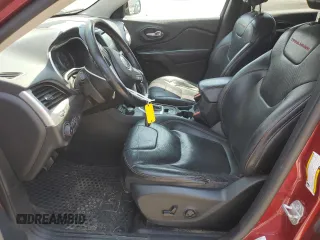 2015 Jeep Cherokee Trailhawk with VIN 1C4PJMBSXFW661218, listed as a Copart auction lot 61364895 with 139,200 mi miles and Salvage title. Bid and sale history available at DreamBid. Image 7.