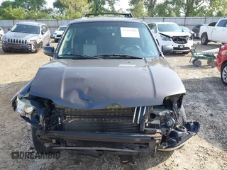 2006 Mercury Mariner Luxury with VIN 4M2YU56196KJ20438, listed as a IAAI auction lot 42394996 with 164,564 mi miles and . Bid and sale history available at DreamBid. Image 13.