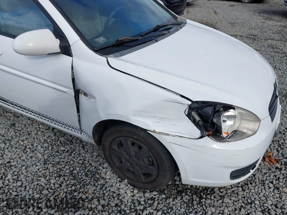 2006 Hyundai Accent GLS with VIN KMHCN46C36U009036, listed as a IAAI auction lot 41705369 with 134,328 mi miles. Bid and sale history available at carsss.com. Image 6.