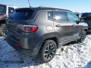 2019 Jeep Compass Trailhawk with VIN 3C4NJDDB3KT602029, listed as a IAAI auction lot 41618243 with 73,088 mi miles and . Bid and sale history available at DreamBid. Image 4.