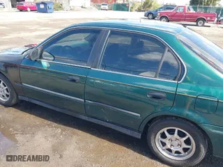 2000 Honda Civic LX with VIN 1HGEJ6672YL022393, listed as a IAAI auction lot 41968262 with 231,261 mi miles. Bid and sale history available at carsss.com. Image 6.