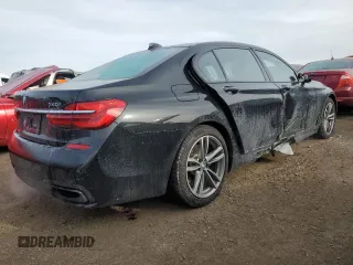 2019 BMW 7 Series 740i xDrive z VIN WBA7E4C50KGV28241, wystawiony jako Copart lot #87329774 z przebiegiem Nie podano mil oraz Szkoda całkowita • Salvage title. Historia ofert i sprzedaży dostępna na DreamBid. Obrazek 3.