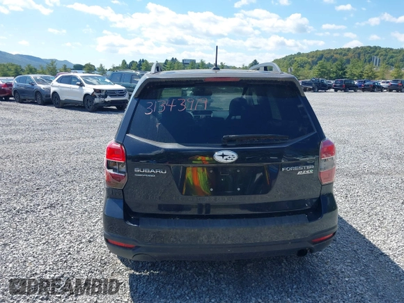2014 Subaru Forester 2.5i Limited with VIN JF2SJAJC9EH517196, listed as a IAAI auction lot 31343919 with 71,396 mi miles. Bid and sale history available at carsss.com. Image 15.