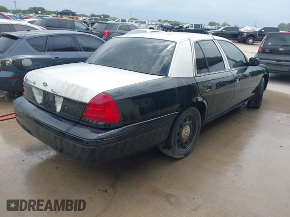 2011 Ford Police Interceptor with VIN 2FABP7BV1BX116467, listed as a IAAI auction lot 42528339 with 195,189 mi miles and . Bid and sale history available at DreamBid. Image 4.