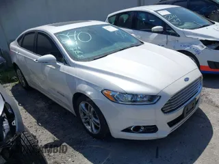 2016 Ford Fusion Titanium Hybrid with VIN 3FA6P0RU1GR259947, listed as a IAAI auction lot 41695377 with 97,605 mi miles. Bid and sale history available at carsss.com. Image 1.