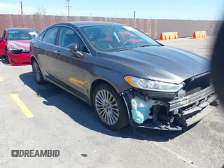 2016 Ford Fusion Titanium with VIN 3FA6P0K90GR158386, listed as a IAAI auction lot 42013629 with 198,029 mi miles. Bid and sale history available at carsss.com. Image 1.