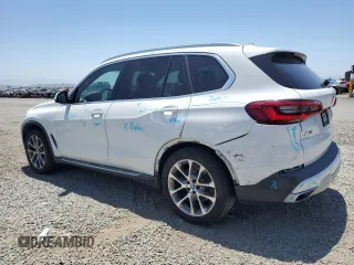 2019 BMW X5 xDrive40i with VIN 5UXCR6C54KLK88490, listed as a Copart auction lot 57917005 with 50,948 mi miles and Salvage title. Bid and sale history available at DreamBid. Image 2.