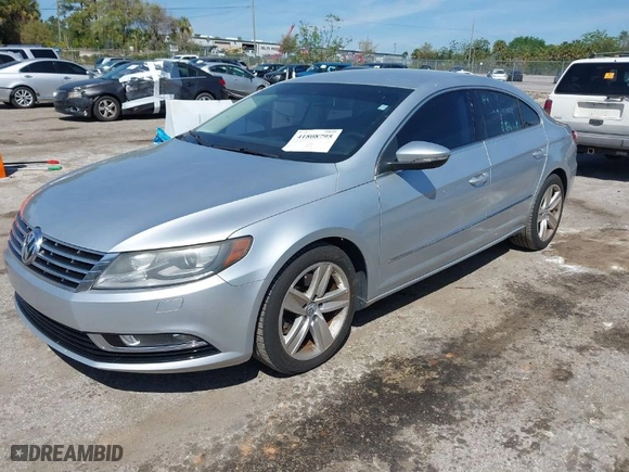 2013 Volkswagen CC Sport with VIN WVWBN7AN7DE556635, listed as a IAAI auction lot 41808795 with 88,482 mi miles. Bid and sale history available at carsss.com. Image 2.