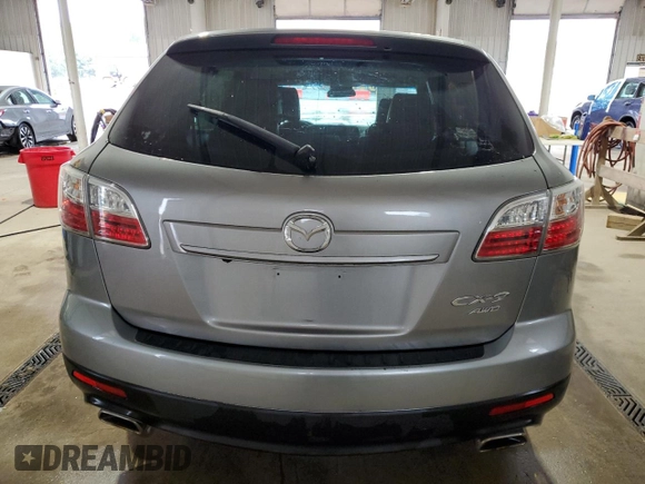 2012 Mazda CX-9 Touring z VIN JM3TB3CV5C0347593, wystawiony jako Copart lot #55675705 z przebiegiem 179 777 mil mil oraz Szkody całkowita. Historia ofert i sprzedaży dostępna na DreamBid. Obrazek 6.