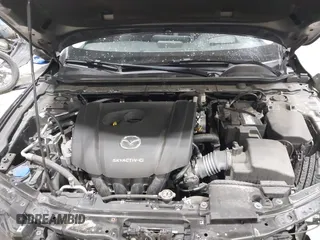 2020 Mazda 3 Premium with VIN 3MZBPBEM3LM123091, listed as a IAAI auction lot 41568213 with 68,515 mi miles and . Bid and sale history available at DreamBid. Image 10.
