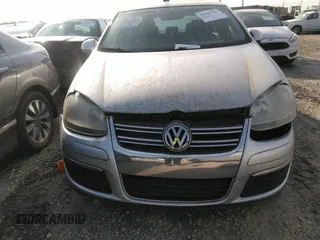 2009 Volkswagen Jetta Wolfsburg Edition with VIN 3VWRJ71K19M013277, listed as a IAAI auction lot 34707512 with 129,034 mi miles and . Bid and sale history available at DreamBid. Image 6.