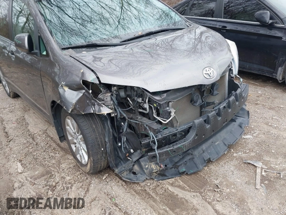 2015 Toyota Sienna Ltd with VIN 5TDDK3DCXFS100341, listed as a IAAI auction lot 41245558 with 114,854 mi miles. Bid and sale history available at carsss.com. Image 6.