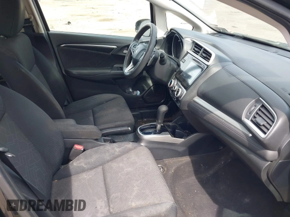 2015 Honda Fit EX-L with VIN 3HGGK5H80FM701502, listed as a IAAI auction lot 42130607 with Not Provided miles and . Bid and sale history available at DreamBid. Image 5.