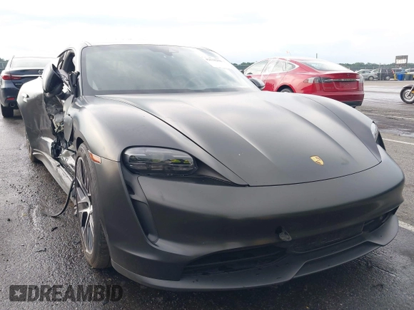 2021 Porsche Taycan 4S z VIN WP0AB2Y13MSA43638, wystawiony jako IAAI lot #42638298 z przebiegiem 27 634 mil mil oraz . Historia ofert i sprzedaży dostępna na DreamBid. Obrazek 1.