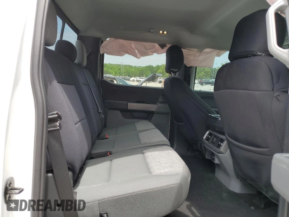2023 Ford F-150 XL with VIN 1FTFW1E85PKG17275, listed as a Copart auction lot 57497155 with 34,379 mi miles and Salvage title. Bid and sale history available at DreamBid. Image 10.