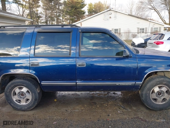 1998 Chevrolet Tahoe with VIN 1GNEK13RXWJ372276, listed as a IAAI auction lot 41458359 with 229,582 mi miles. Bid and sale history available at carsss.com. Image 14.