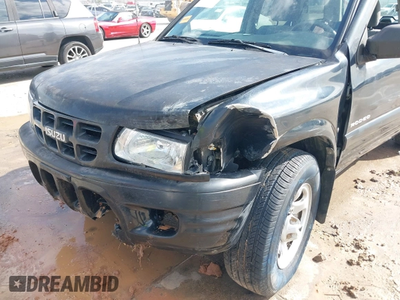 2001 Isuzu Rodeo S with VIN 4S2CK58W114363340, listed as a IAAI auction lot 41498698 with 185,408 mi miles and . Bid and sale history available at DreamBid. Image 6.