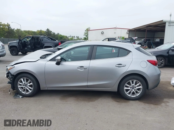 2014 Mazda 3 i Touring with VIN JM1BM1L76E1204265, listed as a IAAI auction lot 42565471 with 68,675 mi miles and . Bid and sale history available at DreamBid. Image 14.