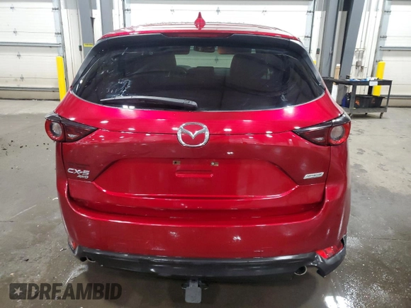 2018 Mazda CX-5 Touring z VIN JM3KFBCM5J0462676, wystawiony jako Copart lot #57892015 z przebiegiem 76 566 mil mil oraz Szkoda całkowita • Salvage title. Historia ofert i sprzedaży dostępna na DreamBid. Obrazek 6.
