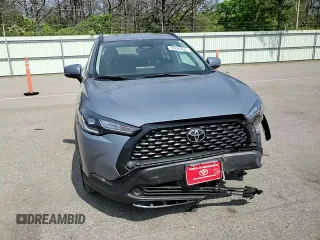 2023 Toyota Corolla Cross LE with VIN 7MUCAABG4PV054828, listed as a Copart auction lot 59466855 with 23,884 mi miles and Salvage title. Bid and sale history available at DreamBid. Image 14.