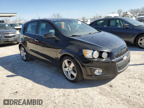 2012 Chevrolet Sonic LTZ z VIN 1G1JE6SHXC4206797, wystawiony jako Copart lot #48520535 z przebiegiem 117 350 mil mil oraz Czysty tytuł • Clean title. Historia ofert i sprzedaży dostępna na DreamBid. Obrazek 4.