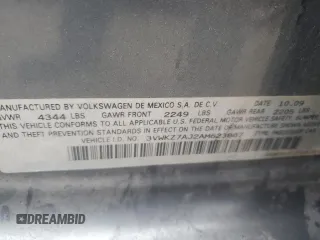 2010 Volkswagen Jetta S with VIN 3VWKZ7AJ2AM623887, listed as a Copart auction lot 84193724 with 148,275 mi miles and Salvage title. Bid and sale history available at DreamBid. Image 12.