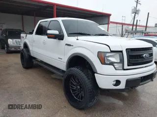 2014 Ford F-150 XL with VIN 1FTFW1ET7EFB21811, listed as a IAAI auction lot 41832286 with 186,556 mi miles. Bid and sale history available at carsss.com. Image 1.