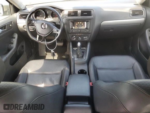 2015 Volkswagen Jetta SE с VIN 3VWD07AJ3FM221970, выставлен на аукционе Copart как лот 54586255 с пробегом 144 727 миль миль и Списание • Salvage title. История ставок и продаж доступна на DreamBid. Изображение 8.
