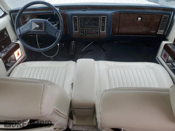 1992 Cadillac Brougham with VIN 1G6DW54E5NR708009, listed as a Copart auction lot 56849345 with 83,203 mi miles and Salvage title. Bid and sale history available at DreamBid. Image 8.