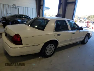 2006 Mercury Grand Marquis GS z VIN 2MEFM74V96X621050, wystawiony jako Copart lot #49098465 z przebiegiem 75 561 mil mil oraz Szkoda całkowita • Salvage title. Historia ofert i sprzedaży dostępna na DreamBid. Obrazek 3.