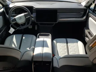 2023 Rivian R1S Adventure with VIN 7PDSGABAXPN010623, listed as a Copart auction lot 72176294 with 0 mi miles and Salvage Title. Bid and sale history available at carsss.com. Image 8.