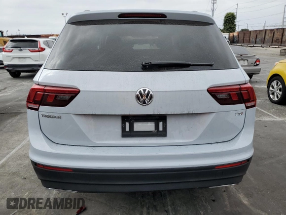 2018 Volkswagen Tiguan S with VIN 3VV1B7AXXJM013468, listed as a Copart auction lot 58371875 with 61,464 mi miles and Salvage title. Bid and sale history available at DreamBid. Image 6.