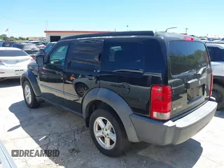 2007 Dodge Nitro SXT z VIN 1D8GT28K57W689694, wystawiony jako IAAI lot #42311713 z przebiegiem 141 344 mil mil oraz . Historia ofert i sprzedaży dostępna na DreamBid. Obrazek 3.