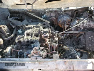 2004 Ford Freestar SE z VIN 2FMZA51674BB22374, wystawiony jako Copart lot #57065105 z przebiegiem Nie podano mil oraz Szkoda całkowita • Salvage title. Historia ofert i sprzedaży dostępna na DreamBid. Obrazek 12.